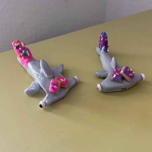 Hammerhead shark figurine with pop tarts