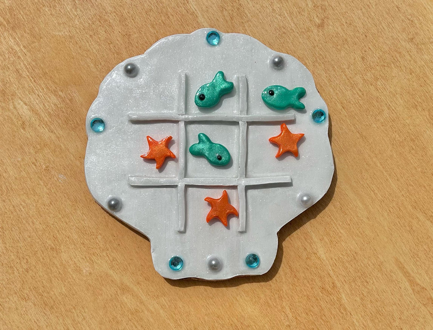 Sea shell tic tac toe board