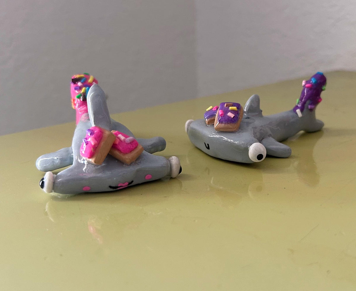 Hammerhead shark figurine with pop tarts