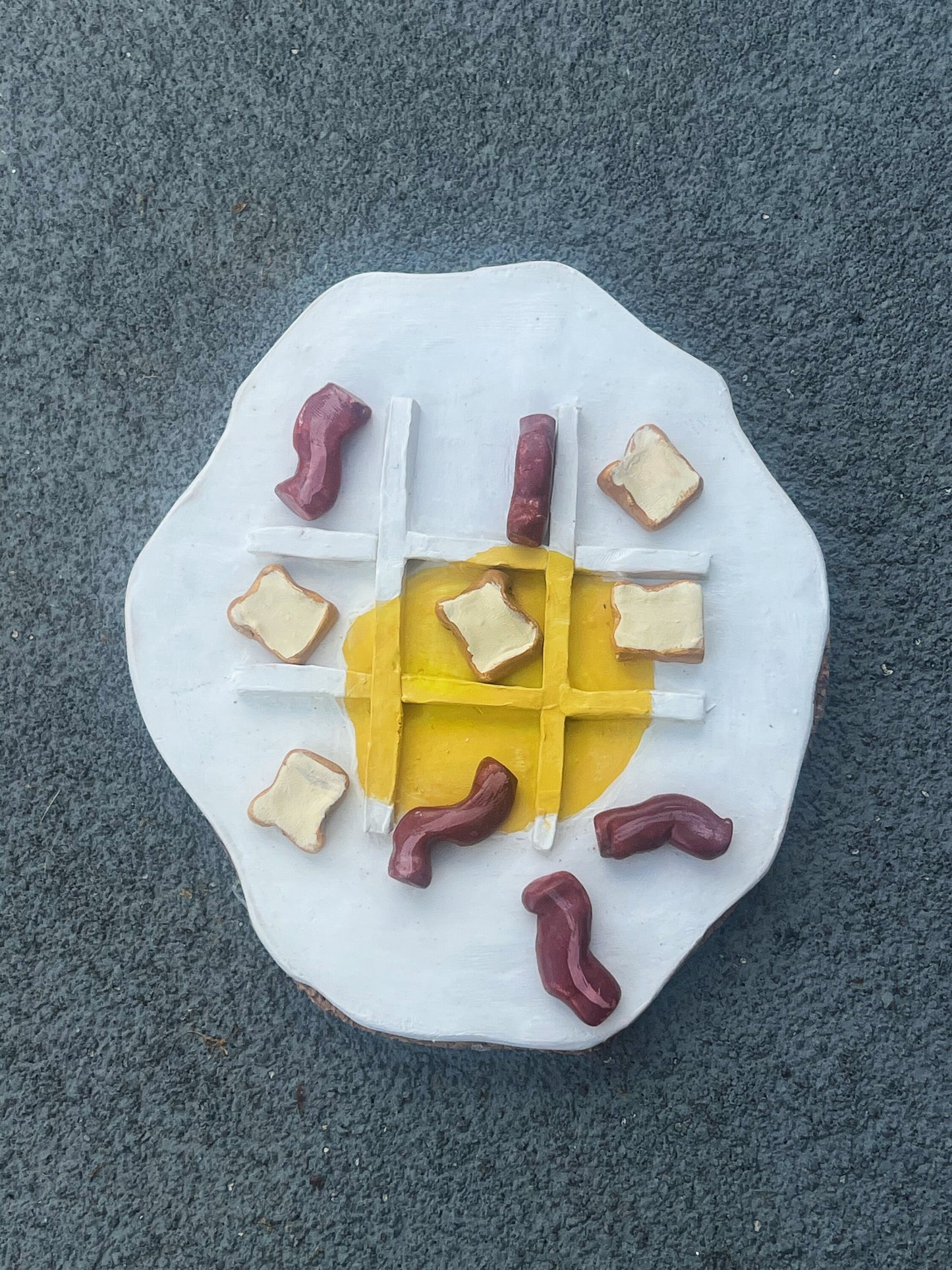 Eggs and bacon waffle tic tac toe board