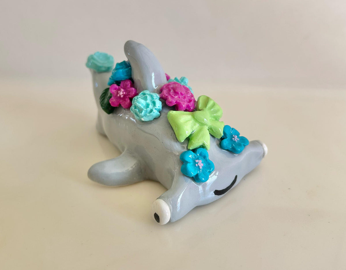 Sculpted hammerhead shark with flowers
