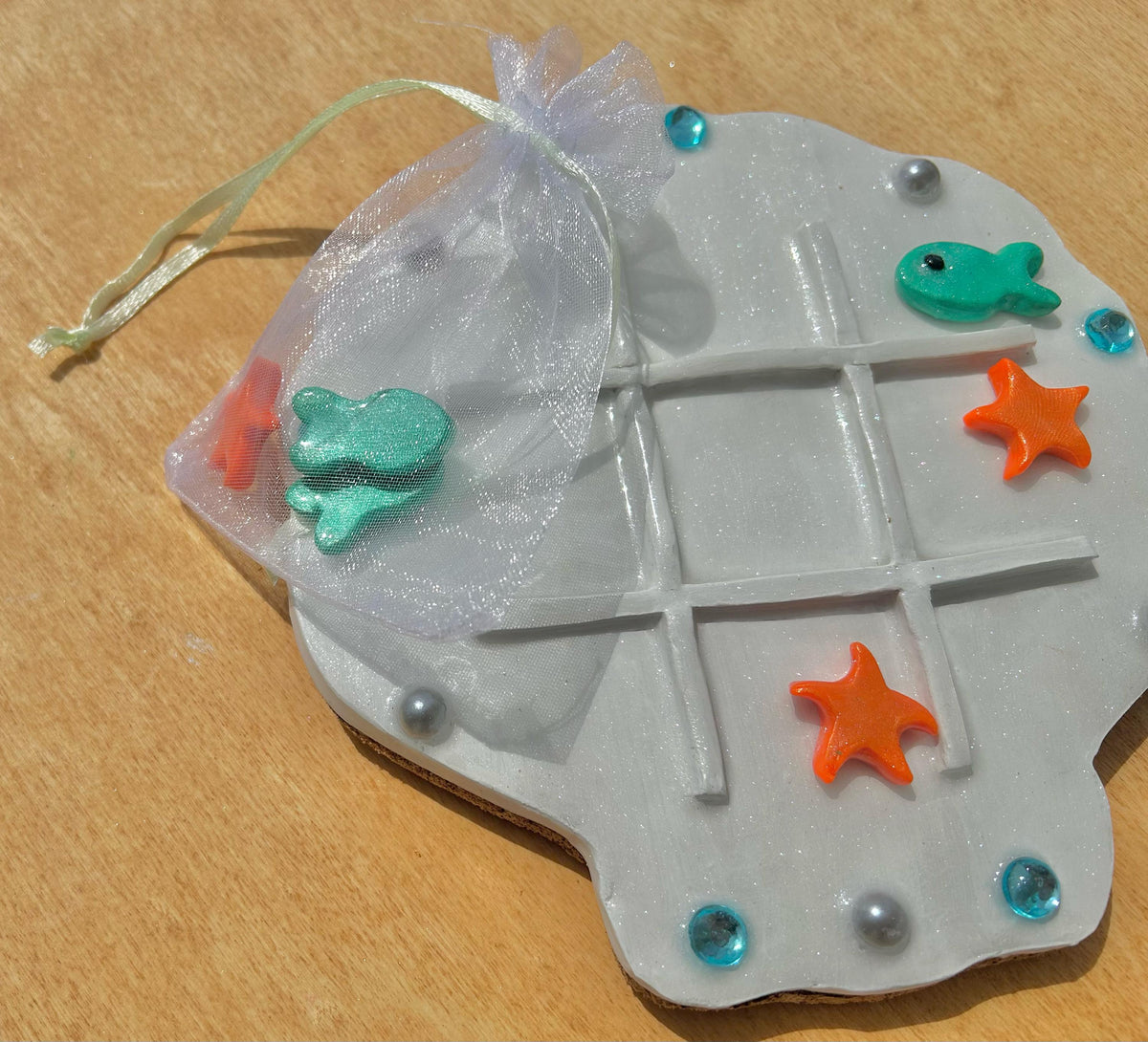 Sea shell tic tac toe board