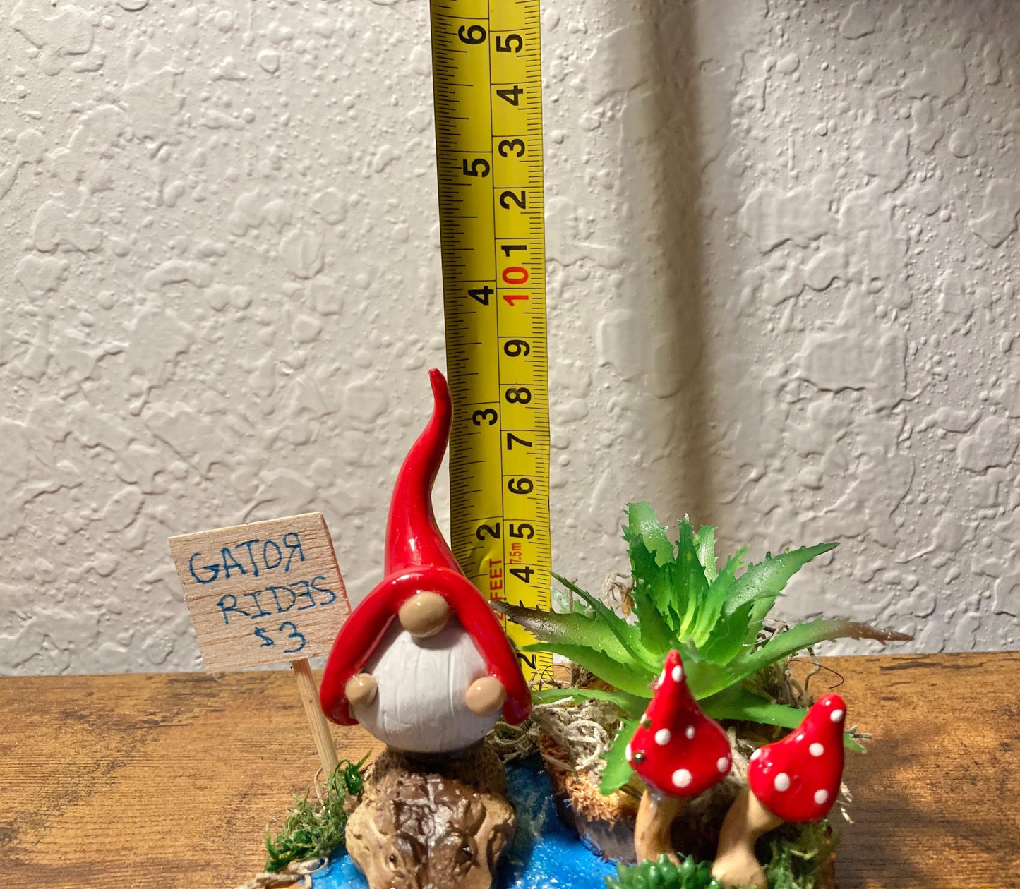 Gnome riding alligator
