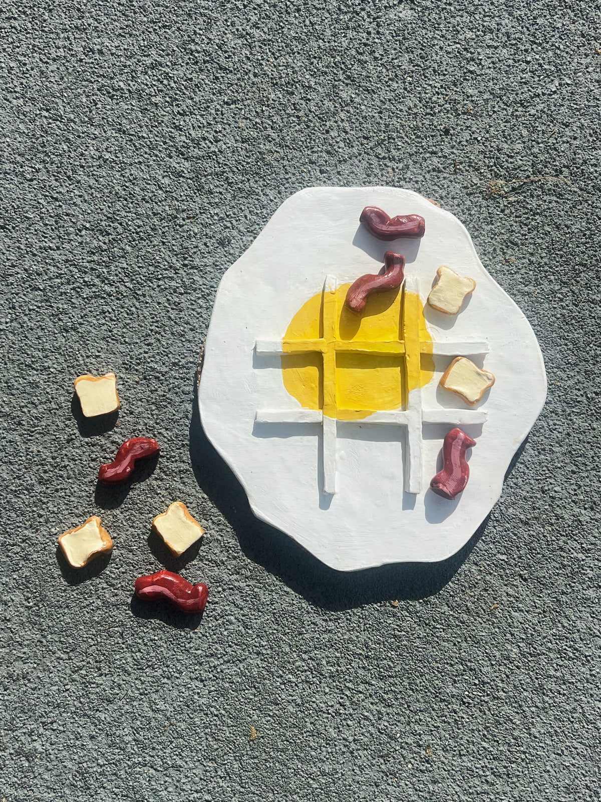 Eggs and bacon waffle tic tac toe board