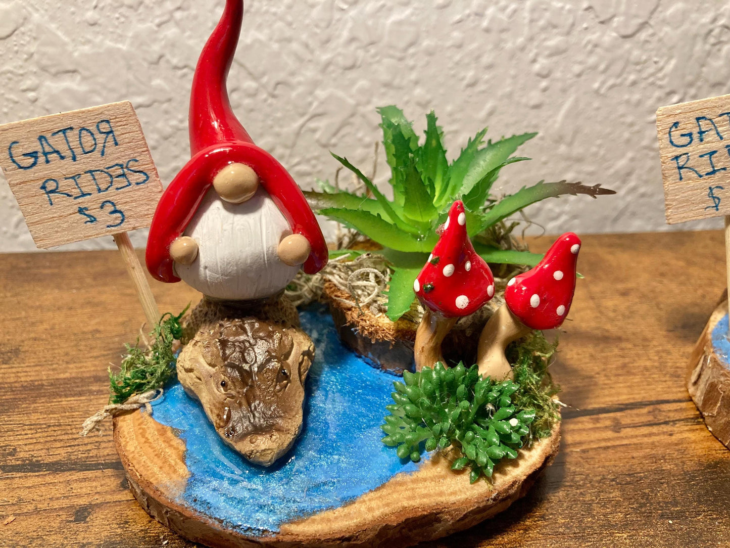 Gnome riding alligator