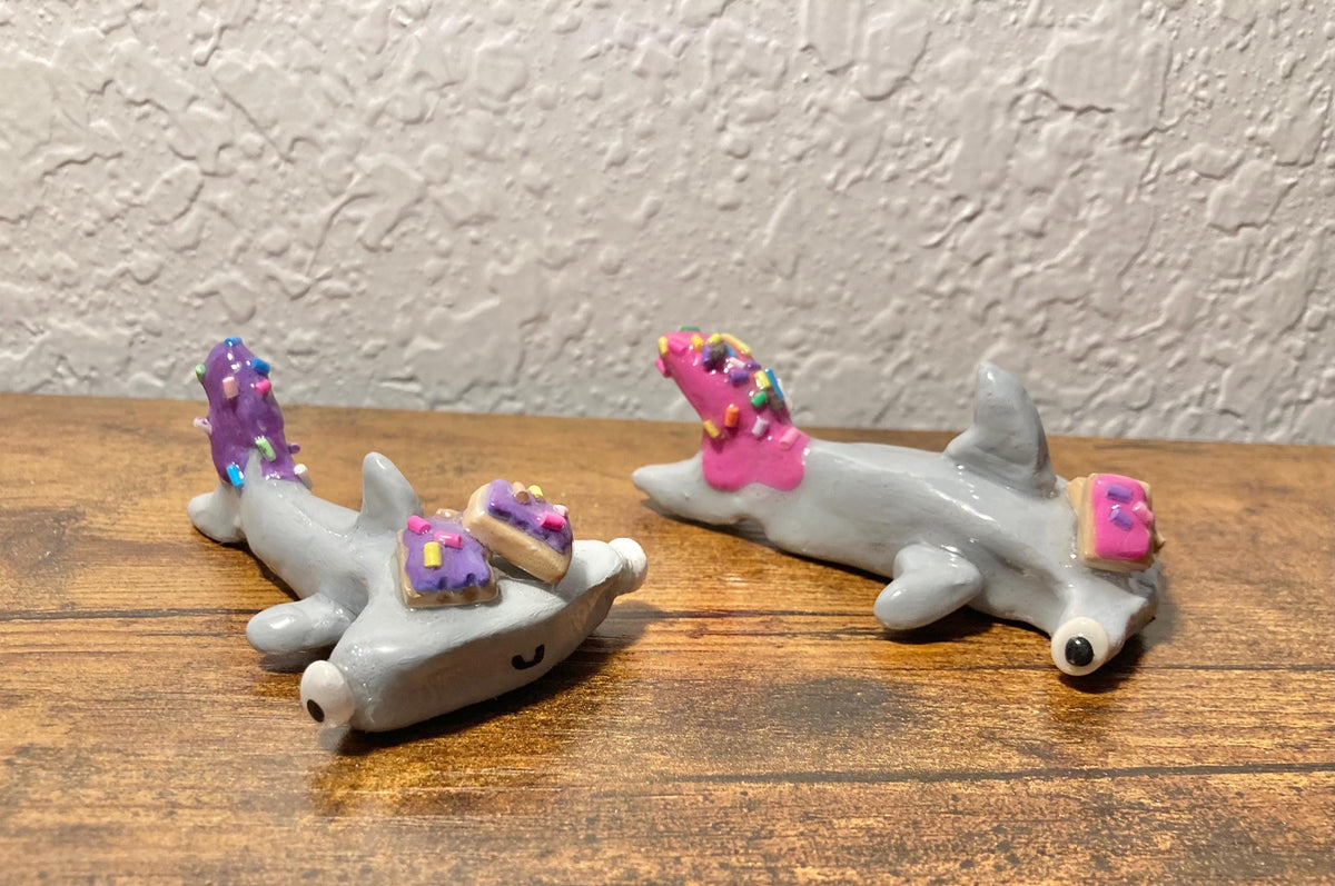 Hammerhead shark figurine with pop tarts