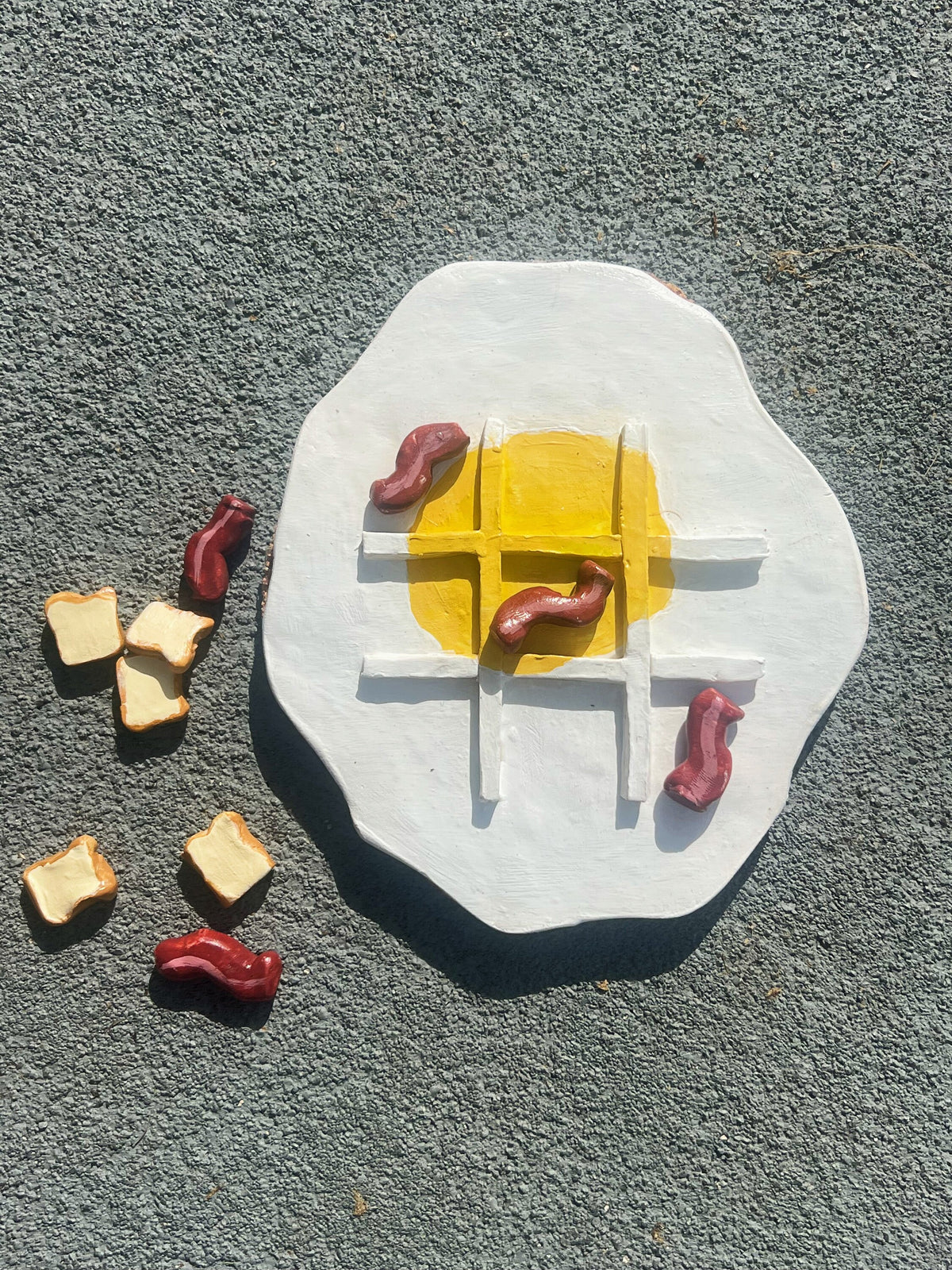 Eggs and bacon waffle tic tac toe board