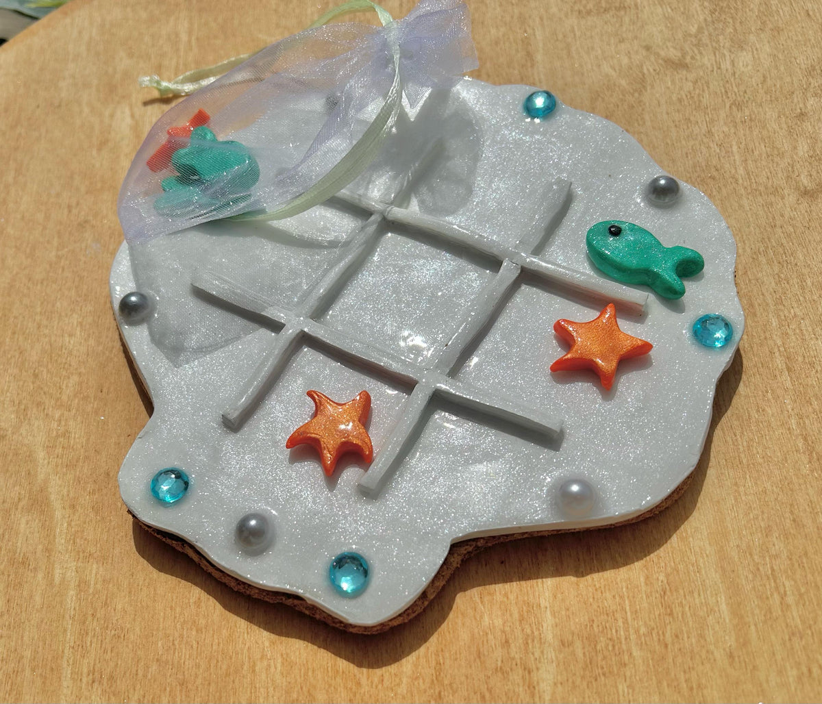 Sea shell tic tac toe board
