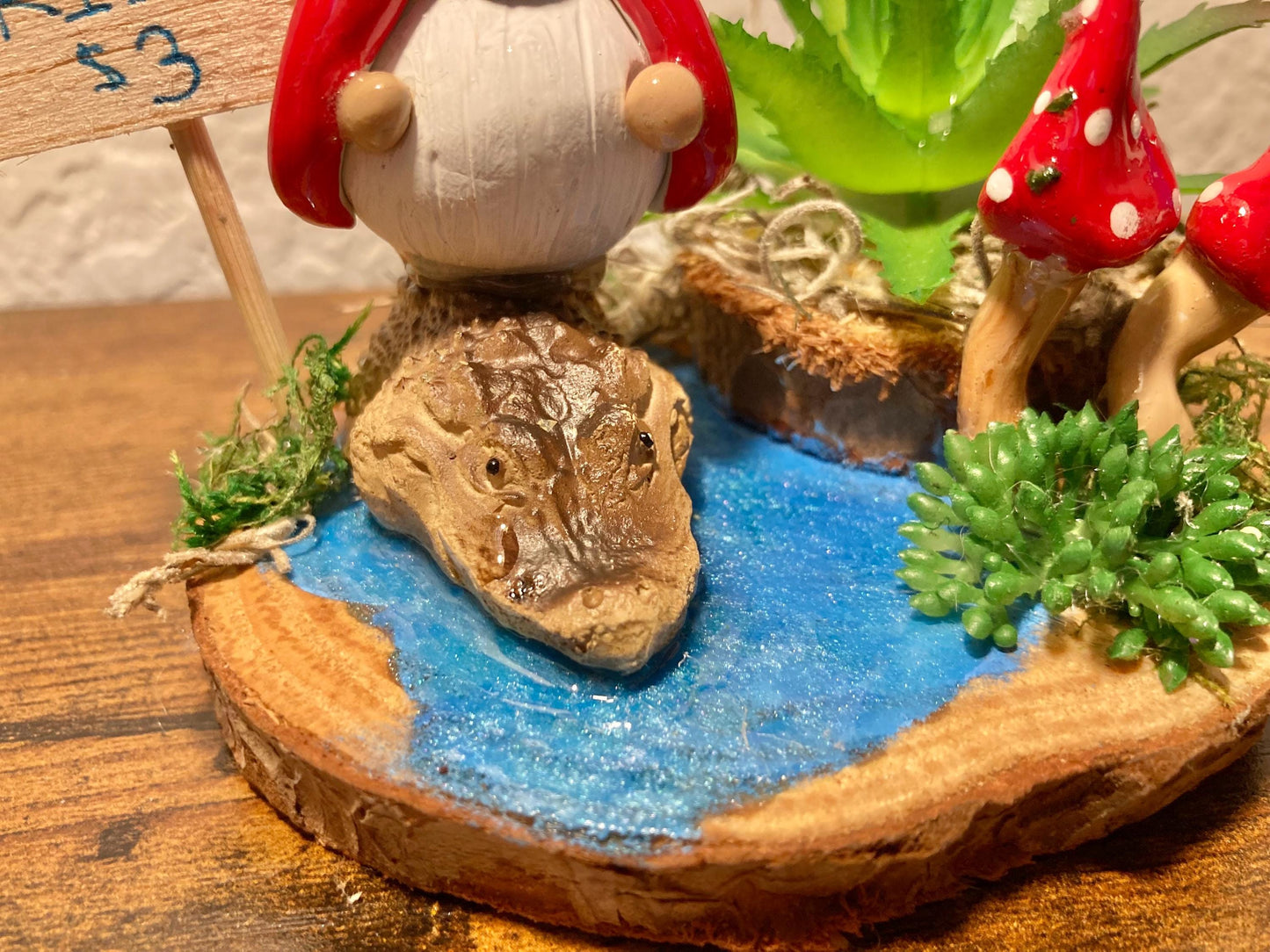 Gnome riding alligator