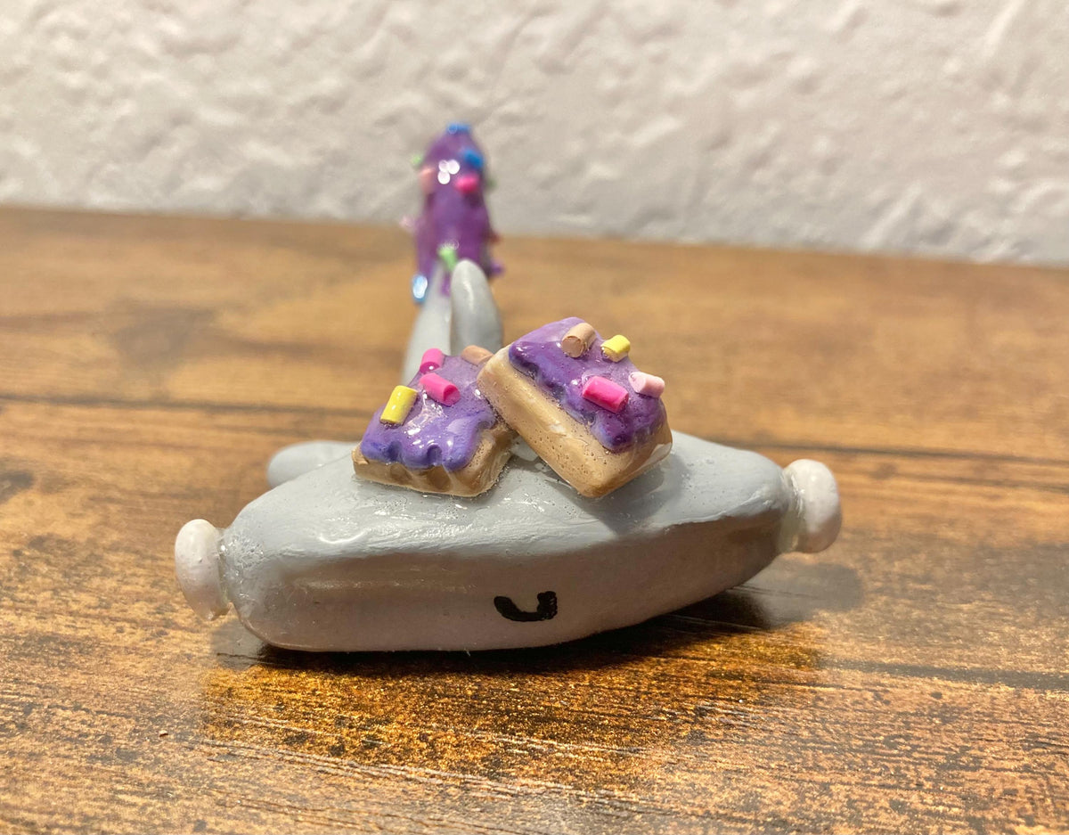 Hammerhead shark figurine with pop tarts