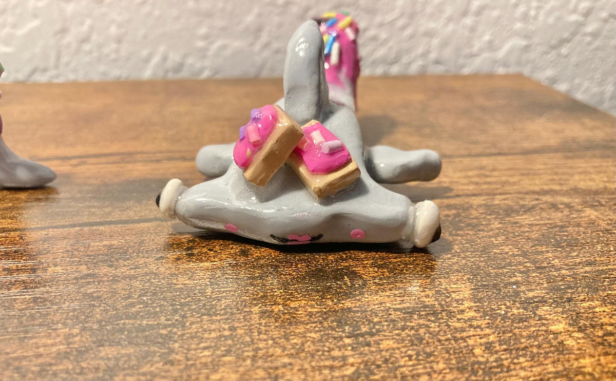 Hammerhead shark figurine with pop tarts